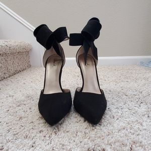 Black stiletto heels with bows
